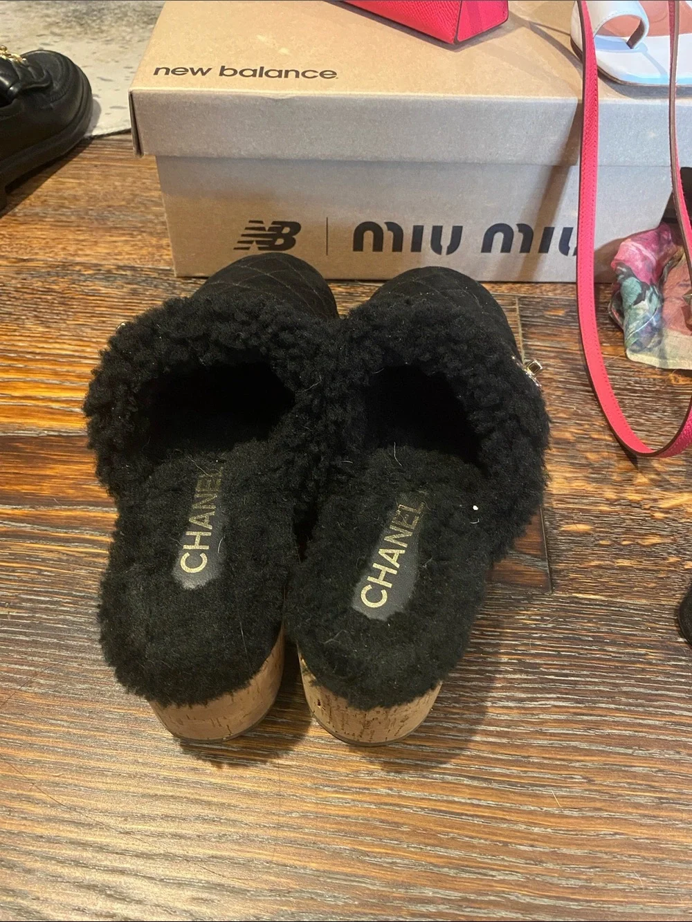 CHANEL Black Quilted Shearling Slip-On Mules with Gold CC Accent